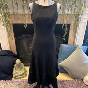 Carmen Marc Valvo black sleeveless formal fit and flare with lace trim dress